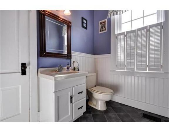 117 South Main Street Middleboro, MA 02346 - Photo 15 of 30 a bathroom with a sink toilet a mirror and shower