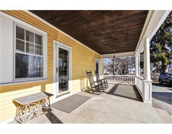 117 South Main Street Middleboro, MA 02346 - Photo 26 of 30 a view of a patio with a table and chairs and potted plants