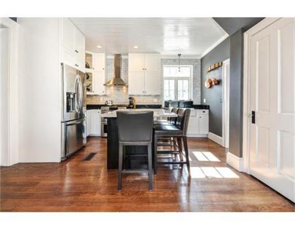 117 South Main Street Middleboro, MA 02346 - Photo 6 of 30 a dining hall with stainless steel appliances wooden floor and dining table