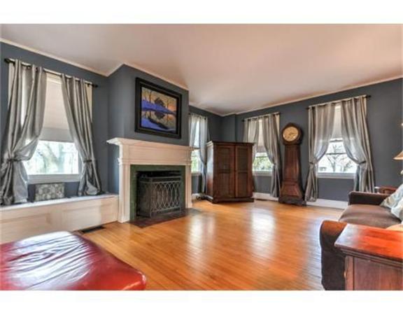117 South Main Street Middleboro, MA 02346 - Photo 7 of 30 a living room with furniture a fireplace and a large window