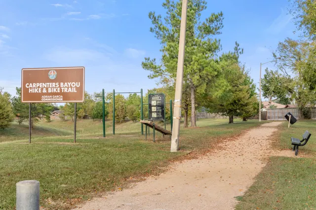 a view of a park with welcome board