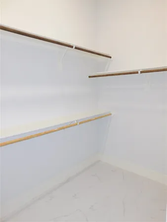 a view of small space with racks on the wall