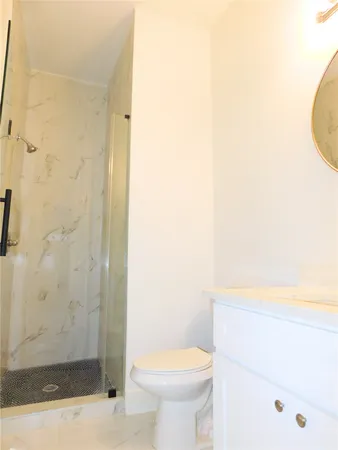 a bathroom with a sink and a toilet