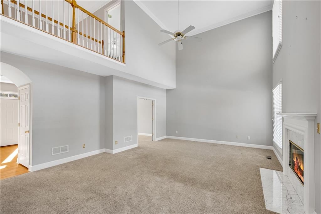 161 Brook Lane Roswell, GA 30075 - Photo 16 of 66 a view of an empty room with a fireplace