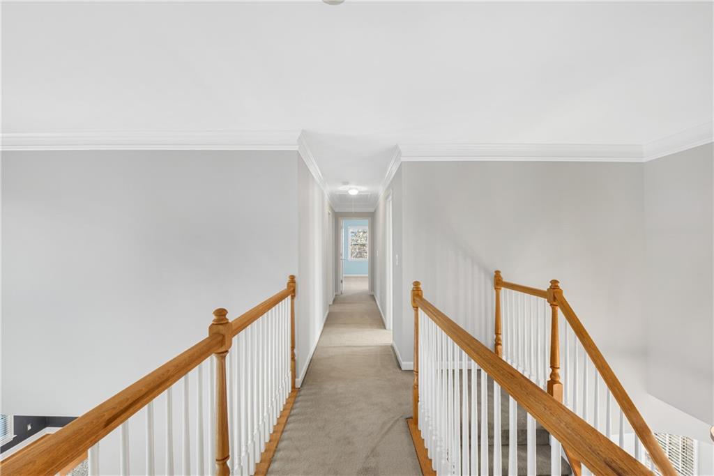 161 Brook Lane Roswell, GA 30075 - Photo 23 of 66 a view of a hallway with stairs