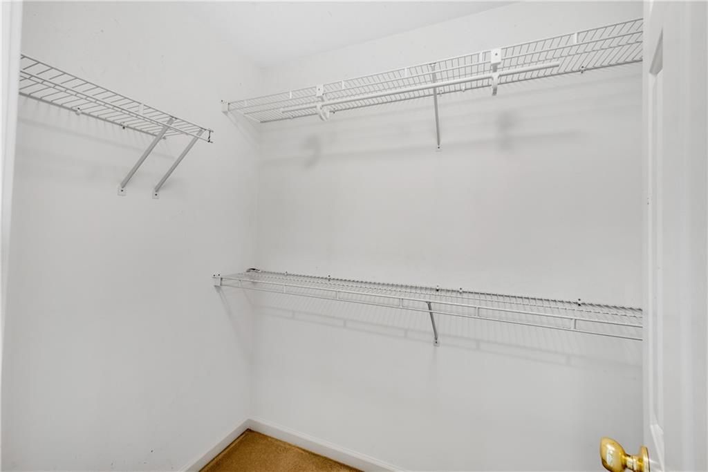 161 Brook Lane Roswell, GA 30075 - Photo 29 of 66 a view of a room with racks on the wall