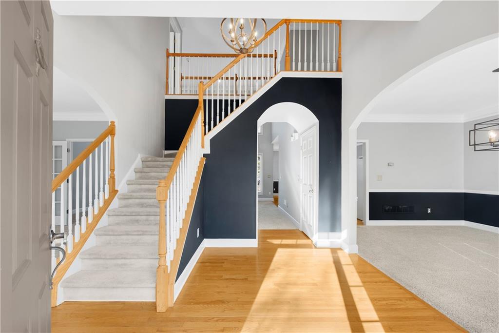 161 Brook Lane Roswell, GA 30075 - Photo 3 of 66 a view of entryway and hall with wooden floor