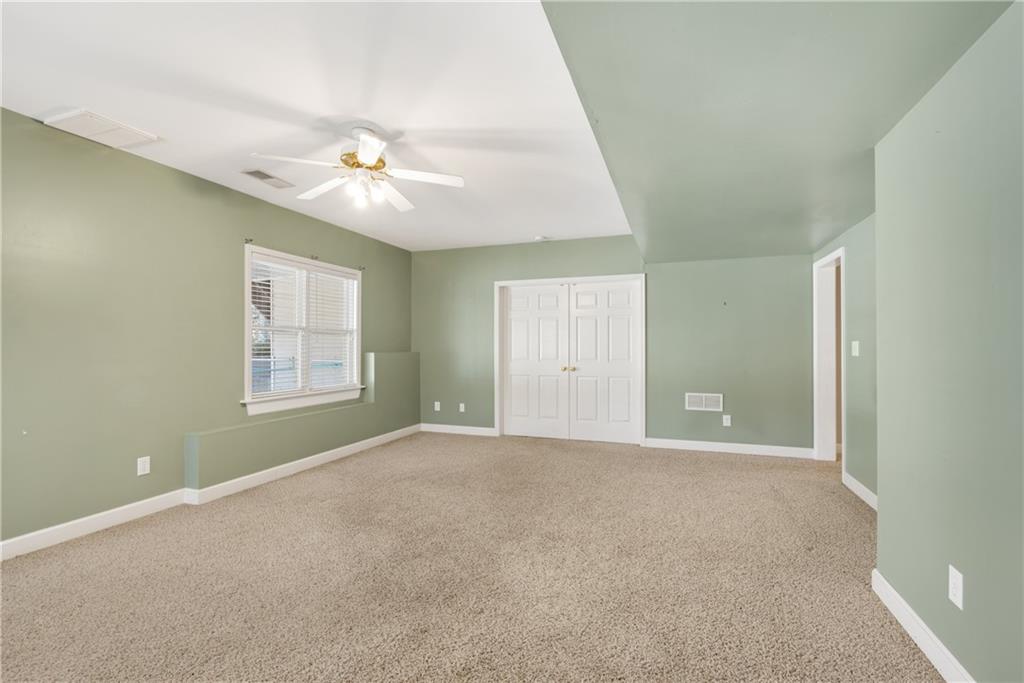 161 Brook Lane Roswell, GA 30075 - Photo 42 of 66 a view of an empty room with a window