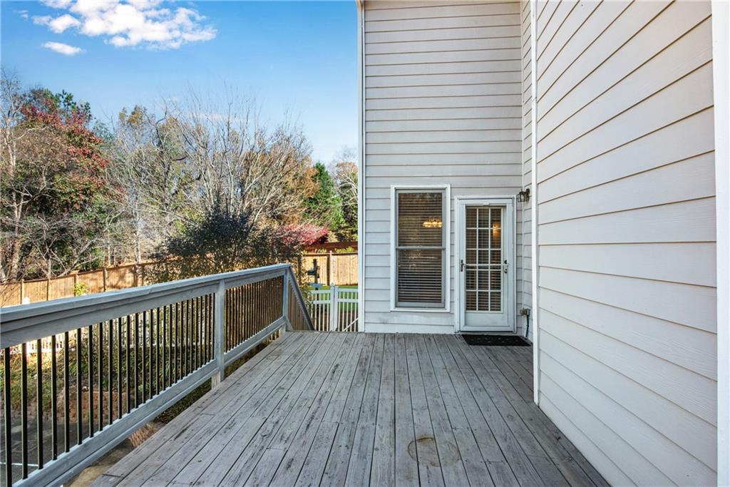 161 Brook Lane Roswell, GA 30075 - Photo 49 of 66 a view of a balcony with wooden floor