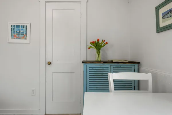 a view of a dining room with furniture window and outside view