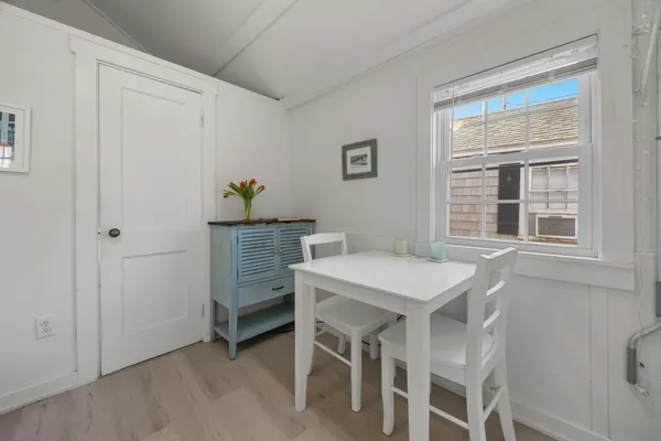 a bedroom with a bed and a table in it