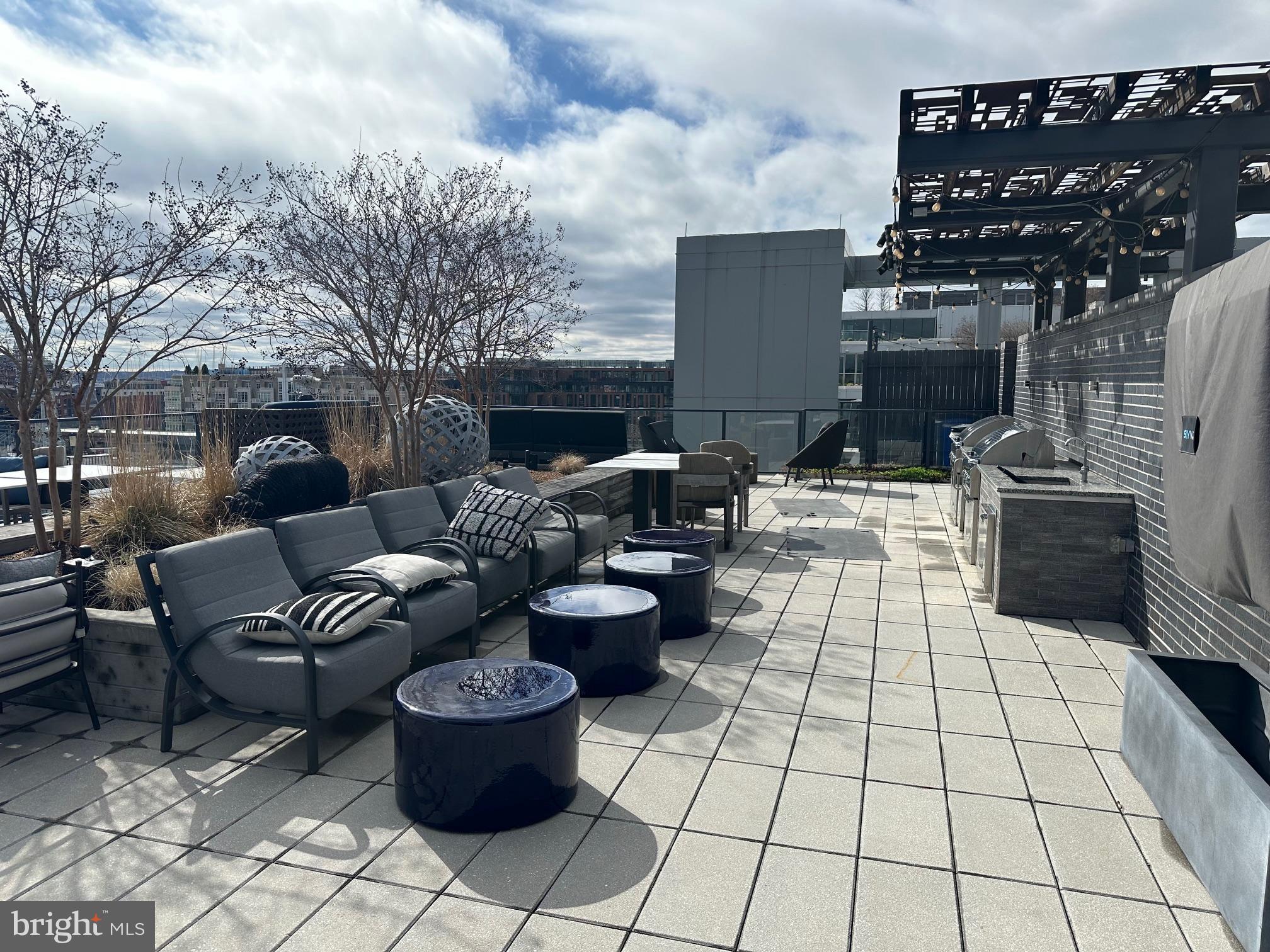 70 N Street Southeast, Unit N215 Washington, DC 20003 - Photo 13 of 16 a view of a terrace with furniture