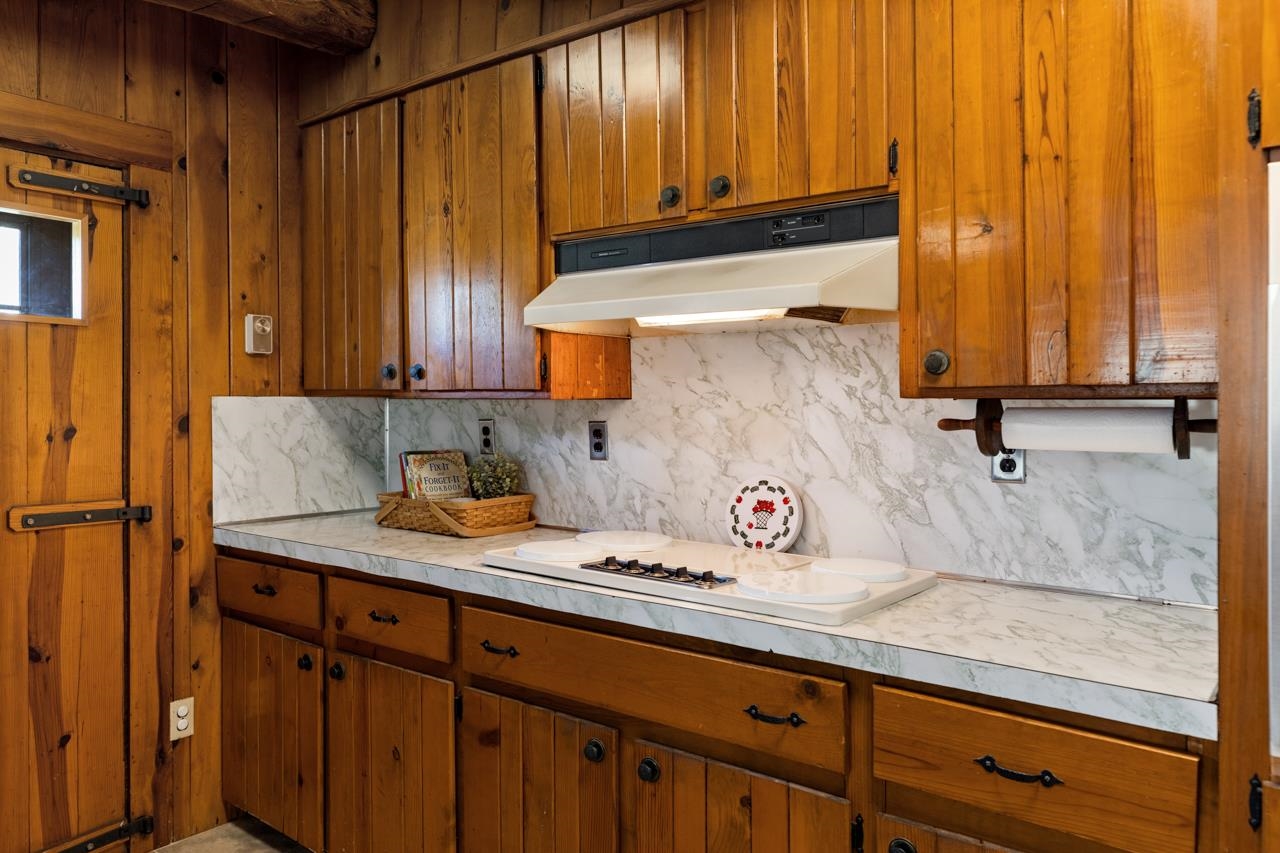 916 Union Church Road Churchville, VA 24421 - Photo 13 of 74 a kitchen with a sink a window and cabinets