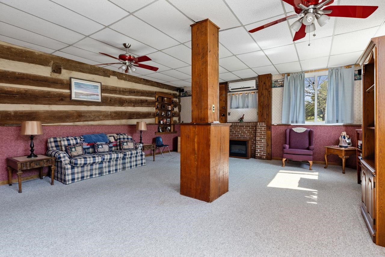 916 Union Church Road Churchville, VA 24421 - Photo 24 of 74 a living room with furniture a flat screen tv and a window