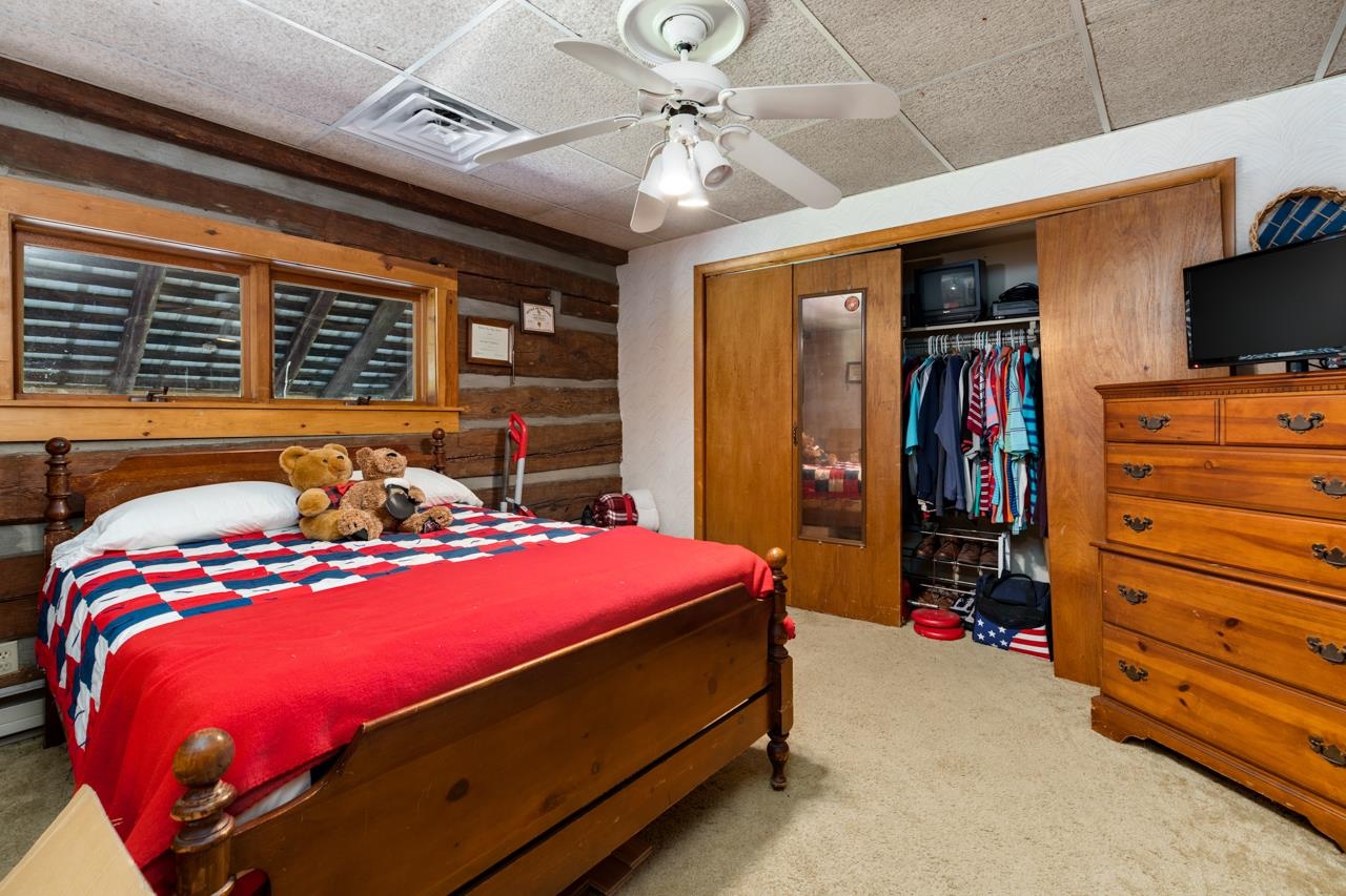 916 Union Church Road Churchville, VA 24421 - Photo 36 of 74 a bedroom with a bed and a flat tv screen
