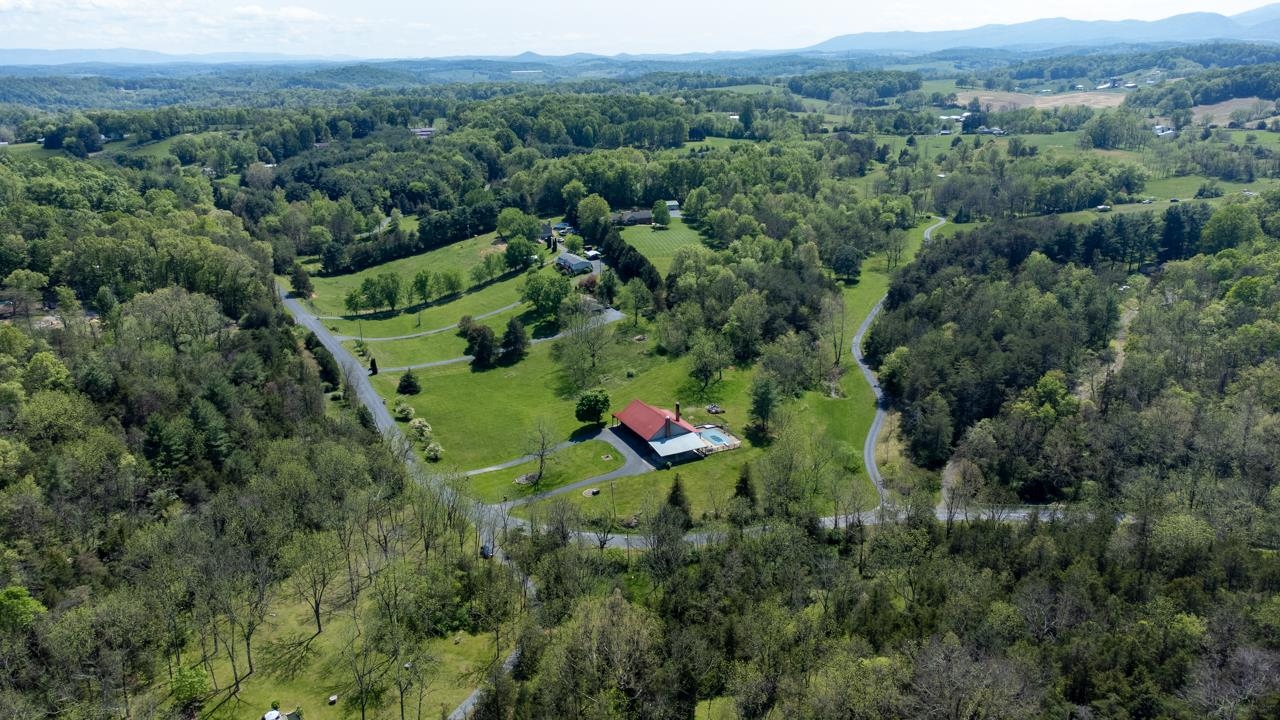 916 Union Church Road Churchville, VA 24421 - Photo 60 of 74 an aerial view of a houses with a lush green hillside