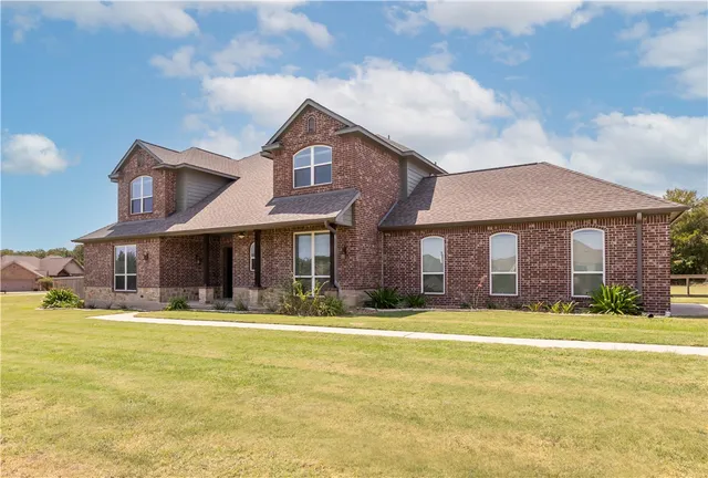 a view of a building with a swimming pool