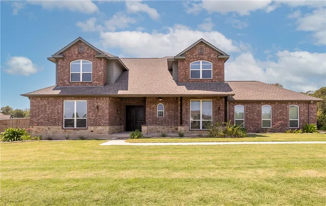 a house view with a outdoor space