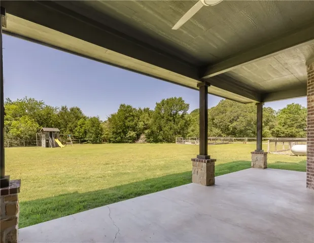 a view of a lake with a big yard