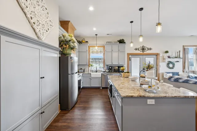 a view of a hallway with wooden walls