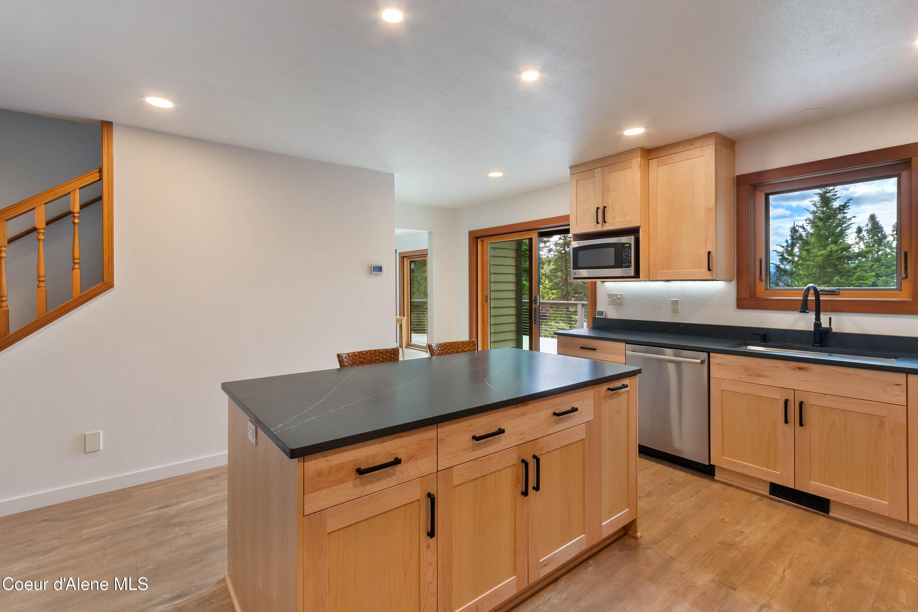2385 Sunnyside Road Sandpoint, ID 83864 - Photo 6 of 64 Kitchen Leads to Deck