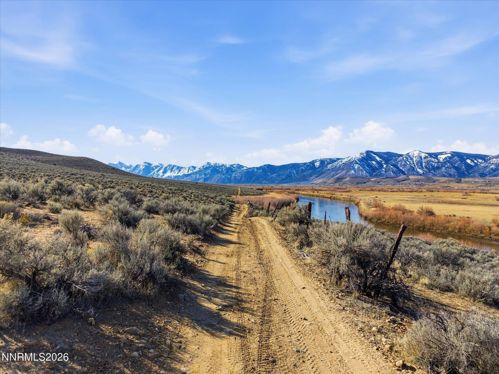 10281 Vicky Lane Minden, NV 89423 - Photo 11 of 19 a view of a lake with a beach
