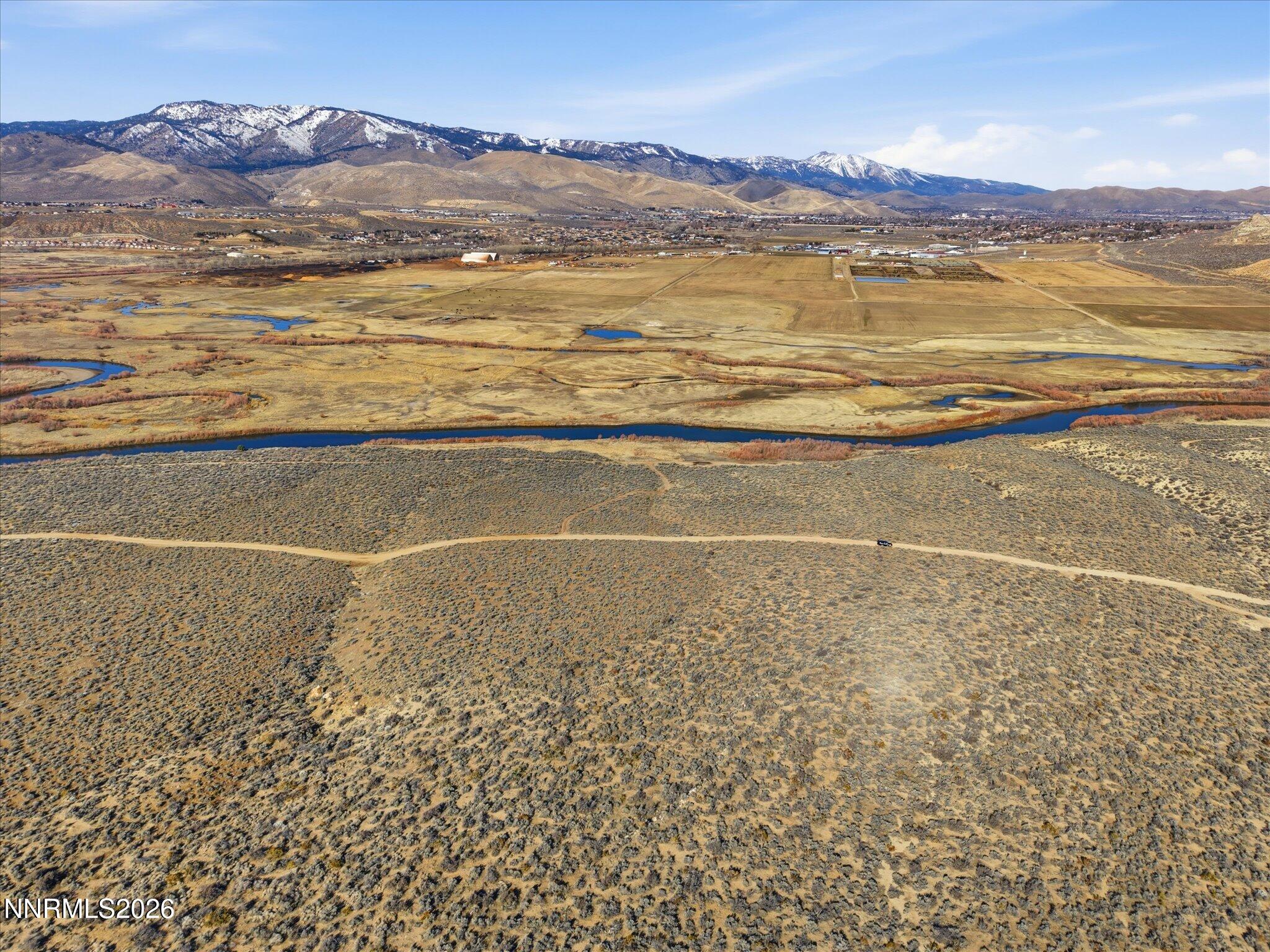 10281 Vicky Lane Minden, NV 89423 - Photo 12 of 19 a view of an ocean and a mountain