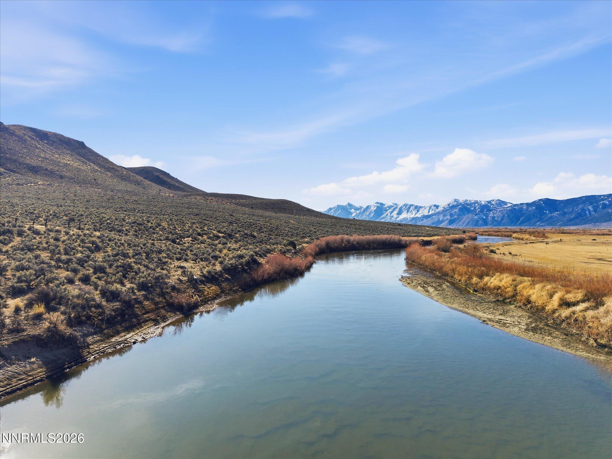10281 Vicky Lane Minden, NV 89423 - Photo 5 of 19 a view of a lake with mountain in the back