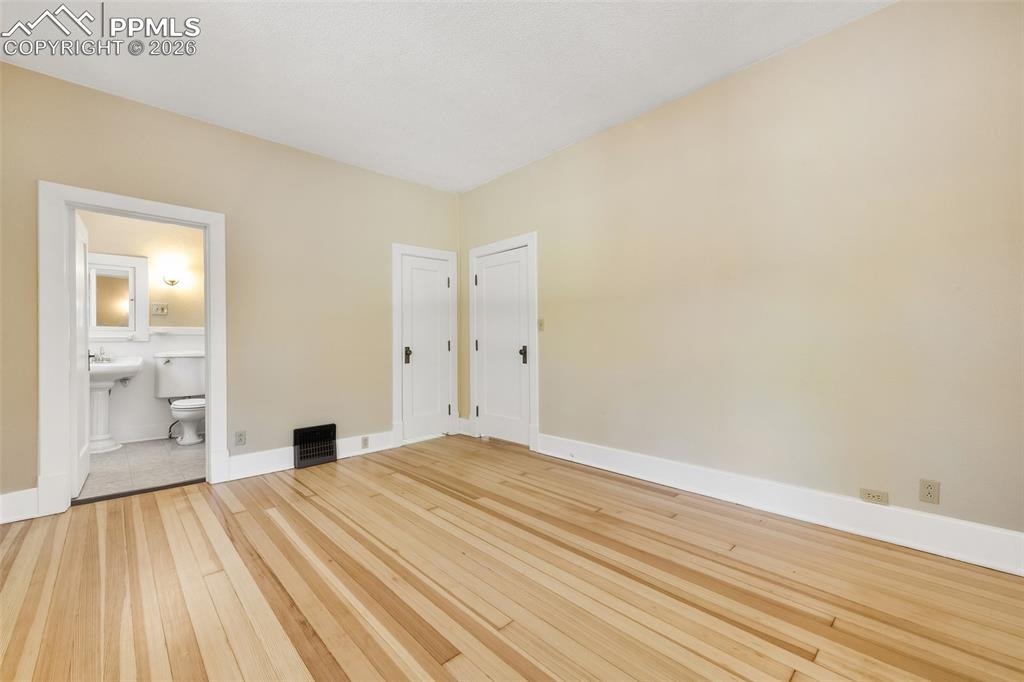 4530 Hagerman Road Cascade, CO 80809 - Photo 23 of 47 Primary Bedroom With View Into Primary Bathroom