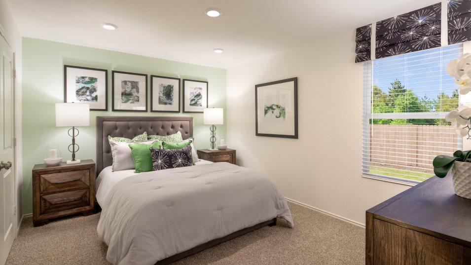 215 Bugbee Kyle, TX 78640 - Photo 8 of 13 a bedroom with a bed and a window