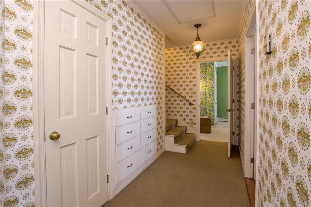 978 Buckfield Road South Paris, ME 04281 - Photo 21 of 31 Hallway in basement, nice built ins,...