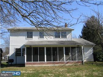 505 Scott Road Oreland, PA 19075 - Photo 2 of 10 a house with trees in the background