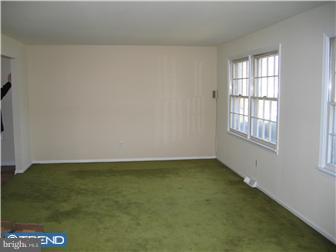 505 Scott Road Oreland, PA 19075 - Photo 5 of 10 an empty room with a window
