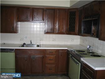 505 Scott Road Oreland, PA 19075 - Photo 6 of 10 a kitchen with a sink and cabinets