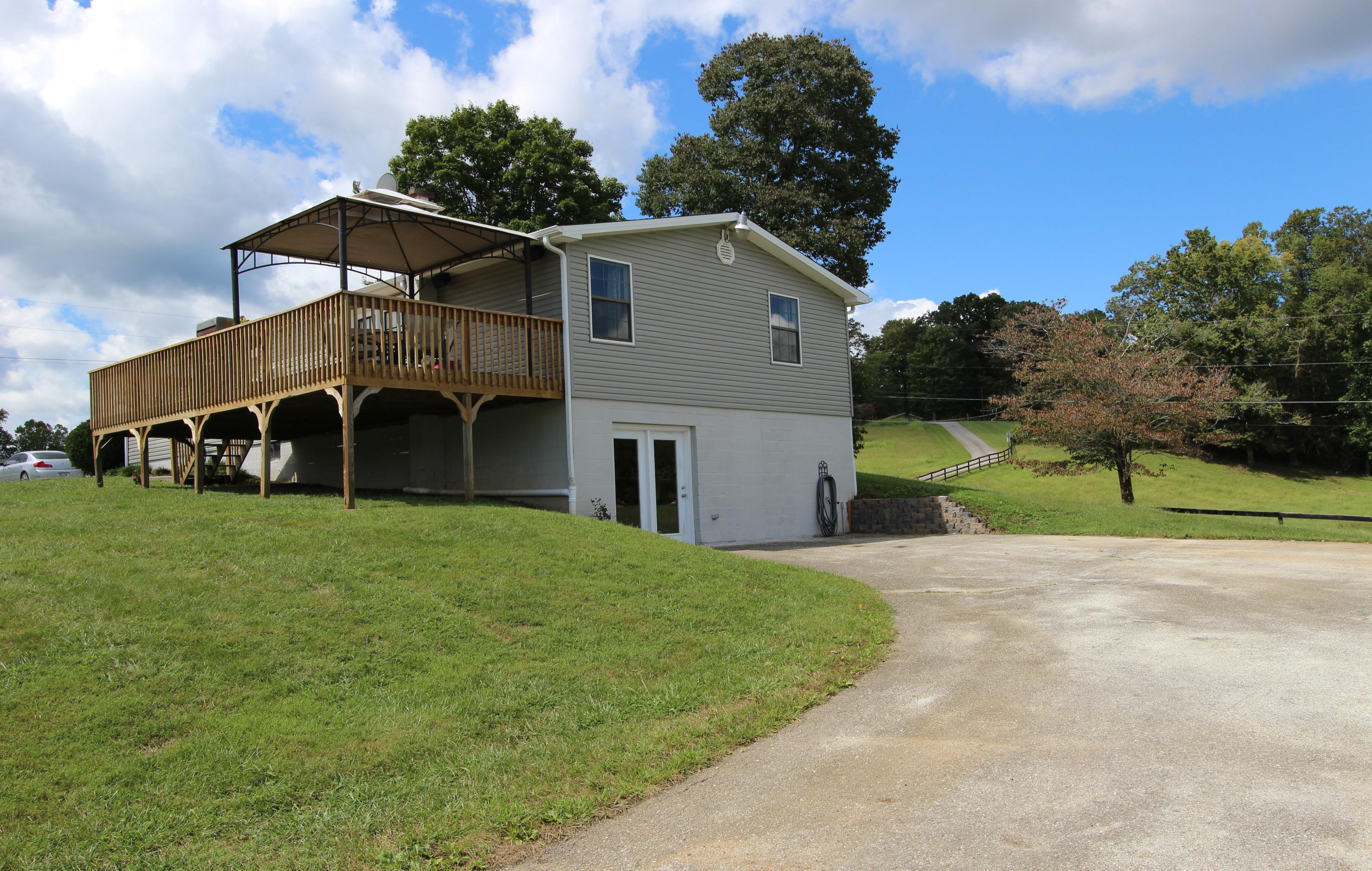 218 Long Hollow Road Clinton, TN 37716 - Photo 25 of 27 Walk-out basement