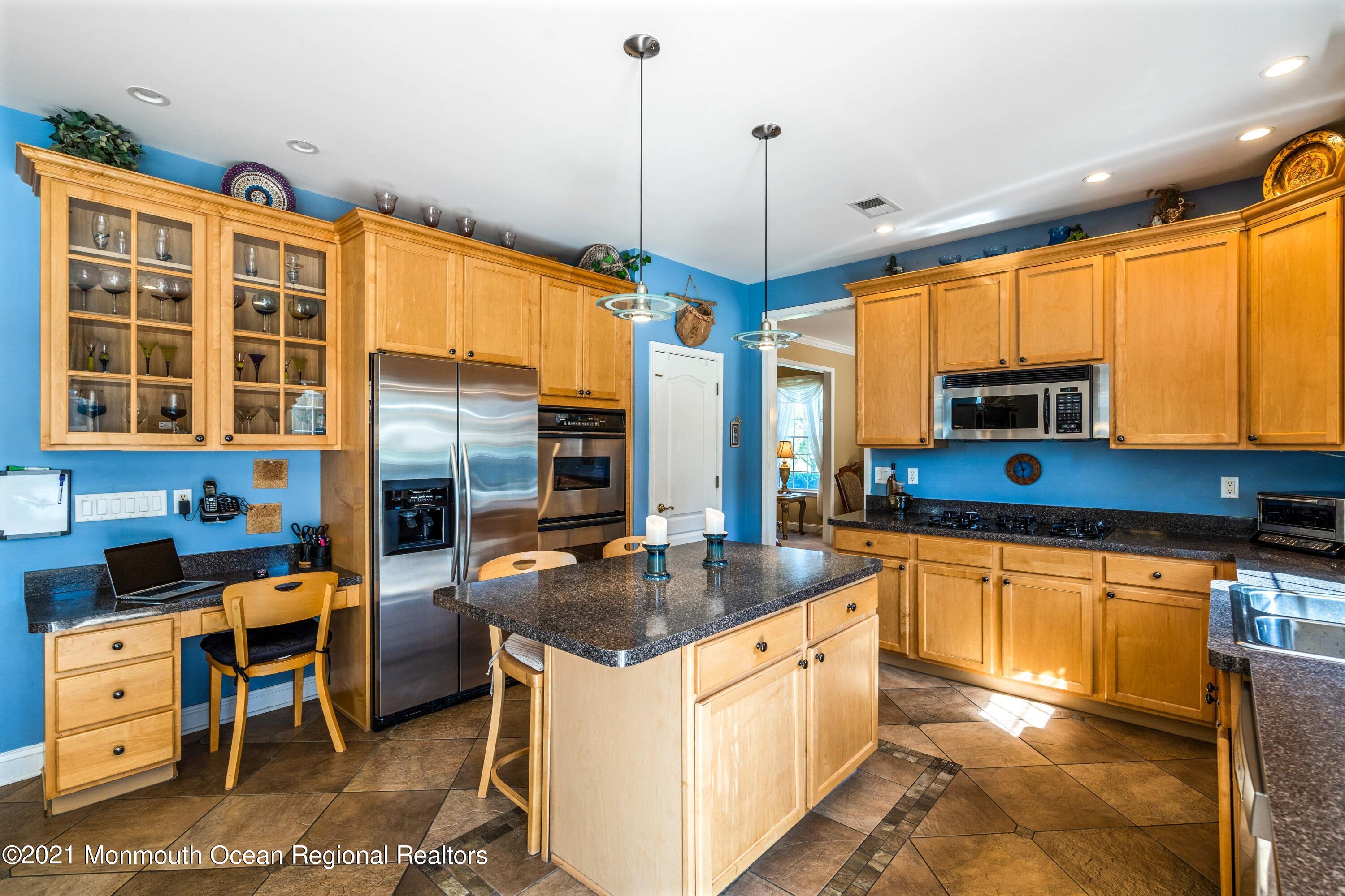 5 Michael Drive Cream Ridge, NJ 08514 - Photo 15 of 69 a kitchen with stainless steel appliances granite countertop a stove a sink and a refrigerator