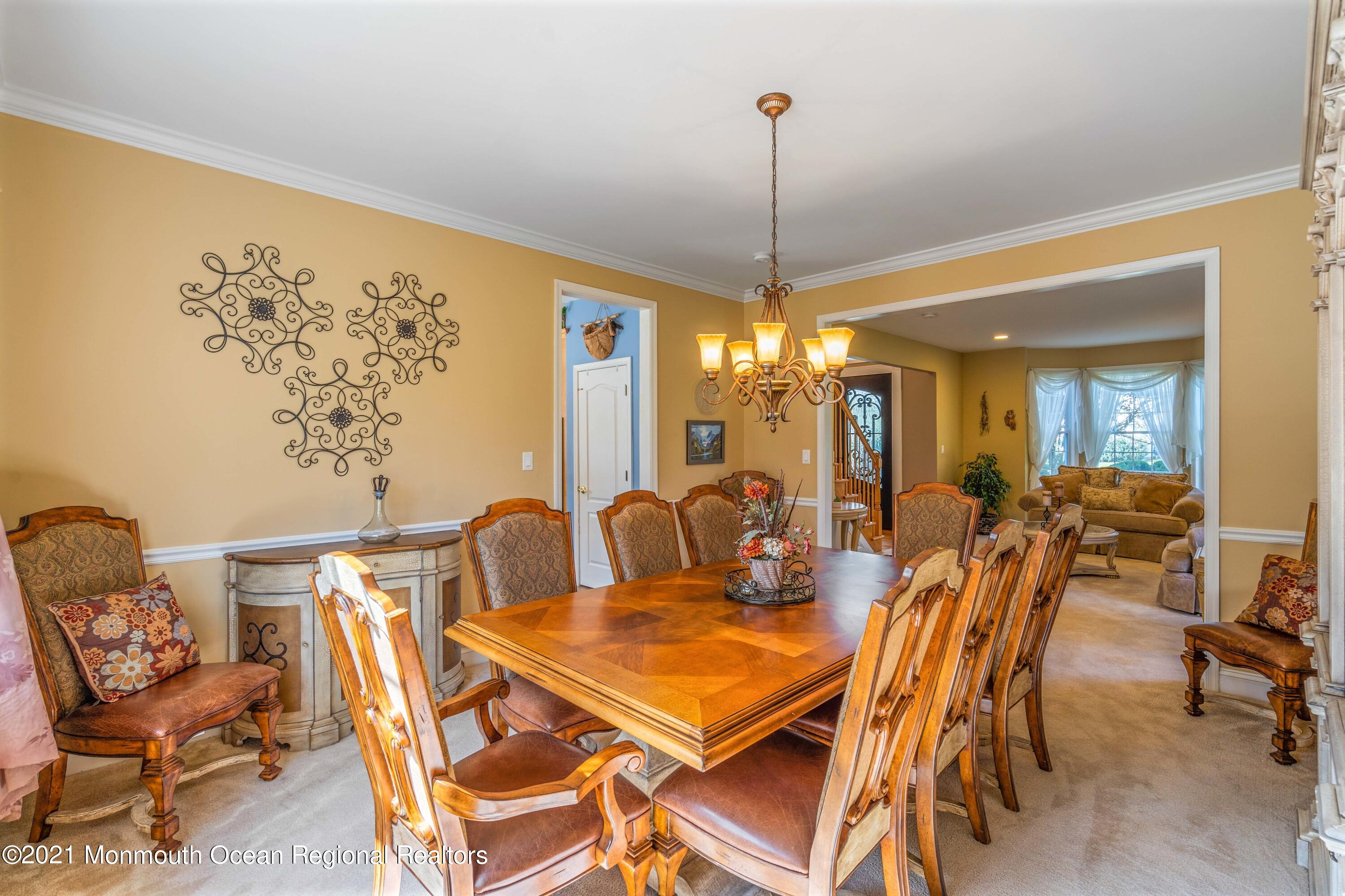 5 Michael Drive Cream Ridge, NJ 08514 - Photo 20 of 69 a view of a dining room with furniture and chandelier