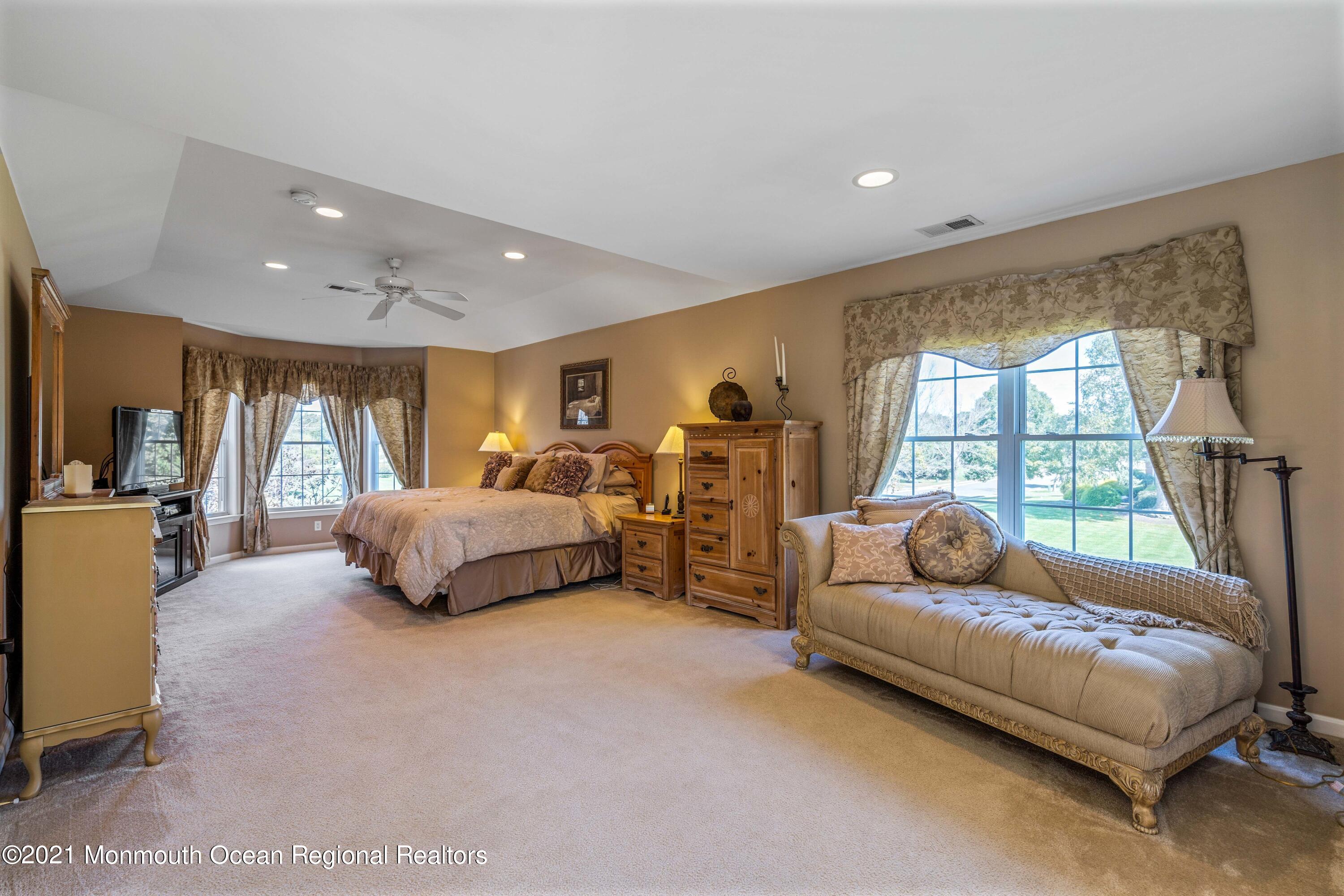 5 Michael Drive Cream Ridge, NJ 08514 - Photo 30 of 69 a spacious bedroom with a bed and large large window