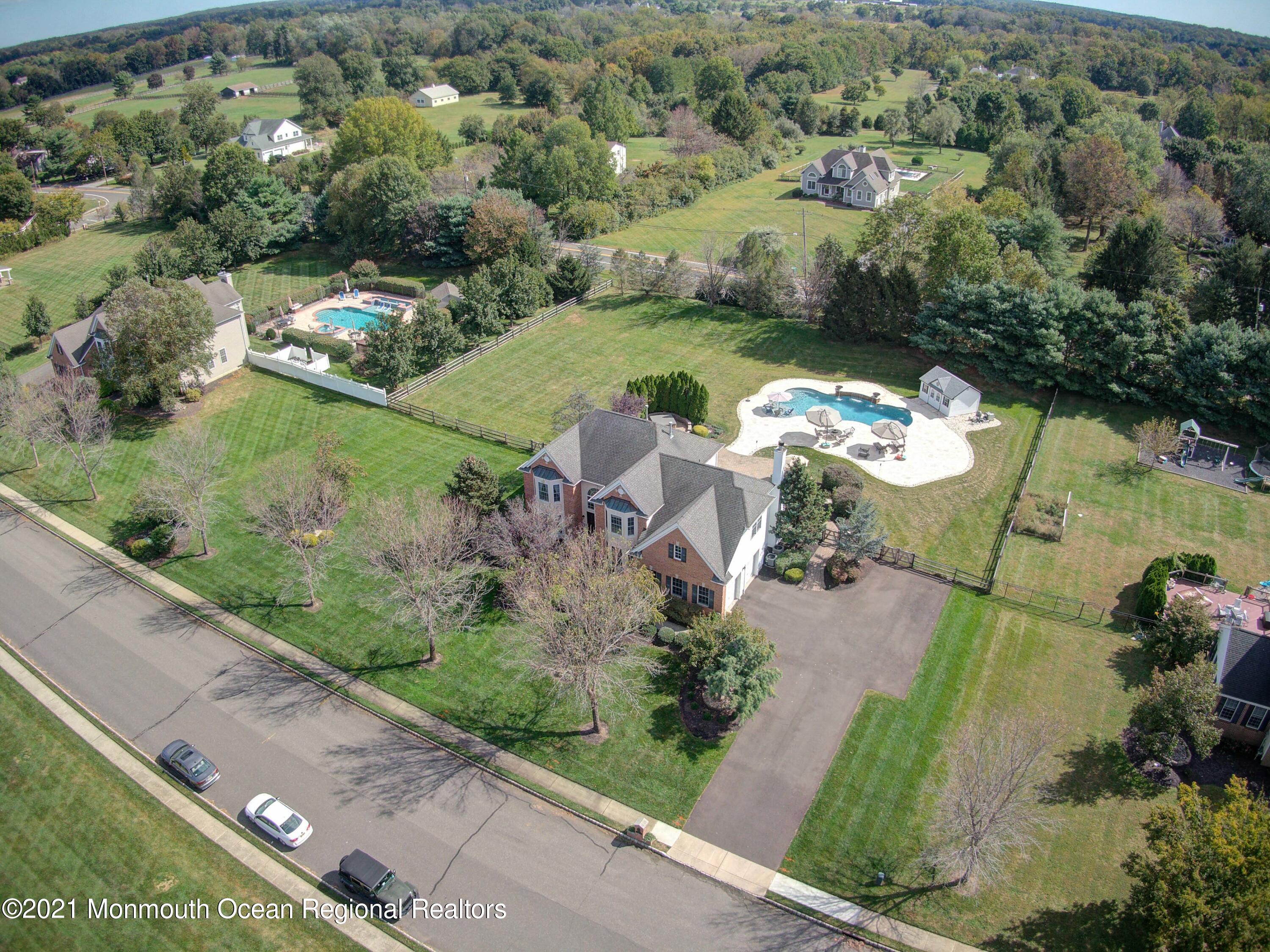 5 Michael Drive Cream Ridge, NJ 08514 - Photo 49 of 69 an aerial view of a house with a yard and lake view