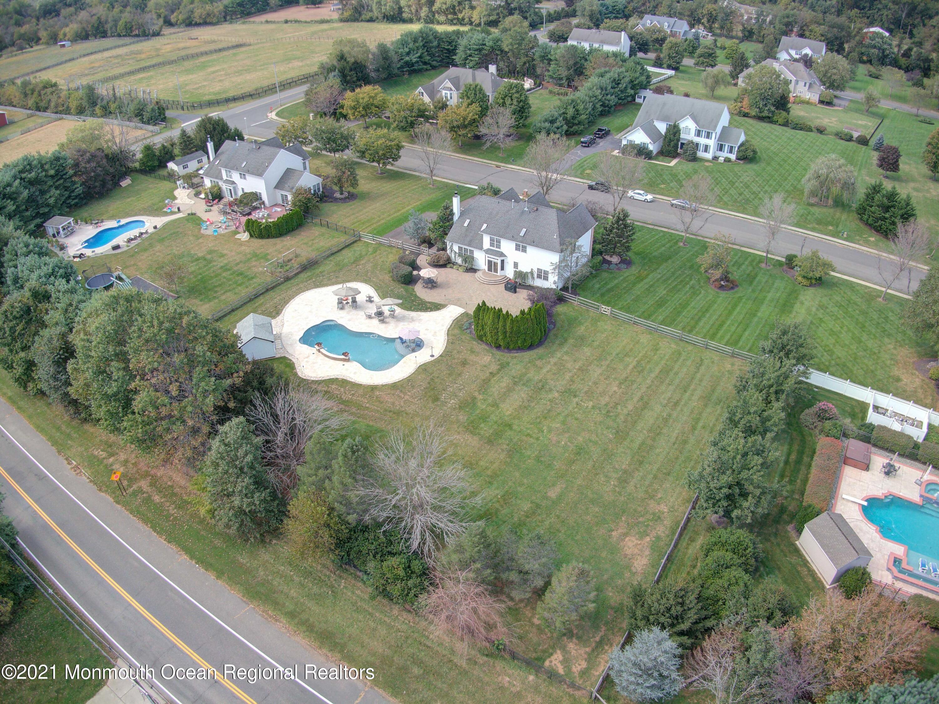 5 Michael Drive Cream Ridge, NJ 08514 - Photo 59 of 69 an aerial view of a house with a yard
