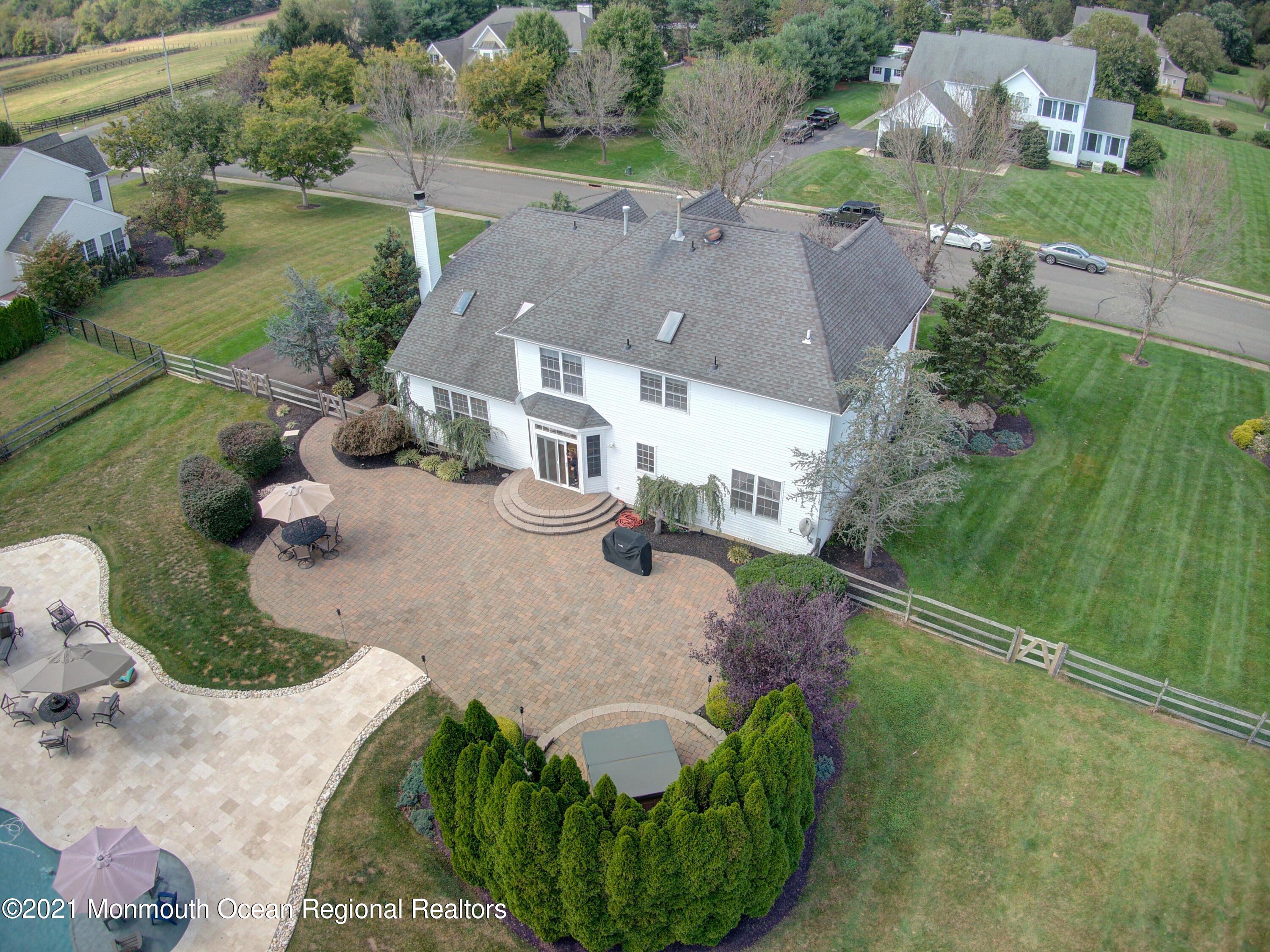 5 Michael Drive Cream Ridge, NJ 08514 - Photo 60 of 69 an aerial view of a house with a yard and lake