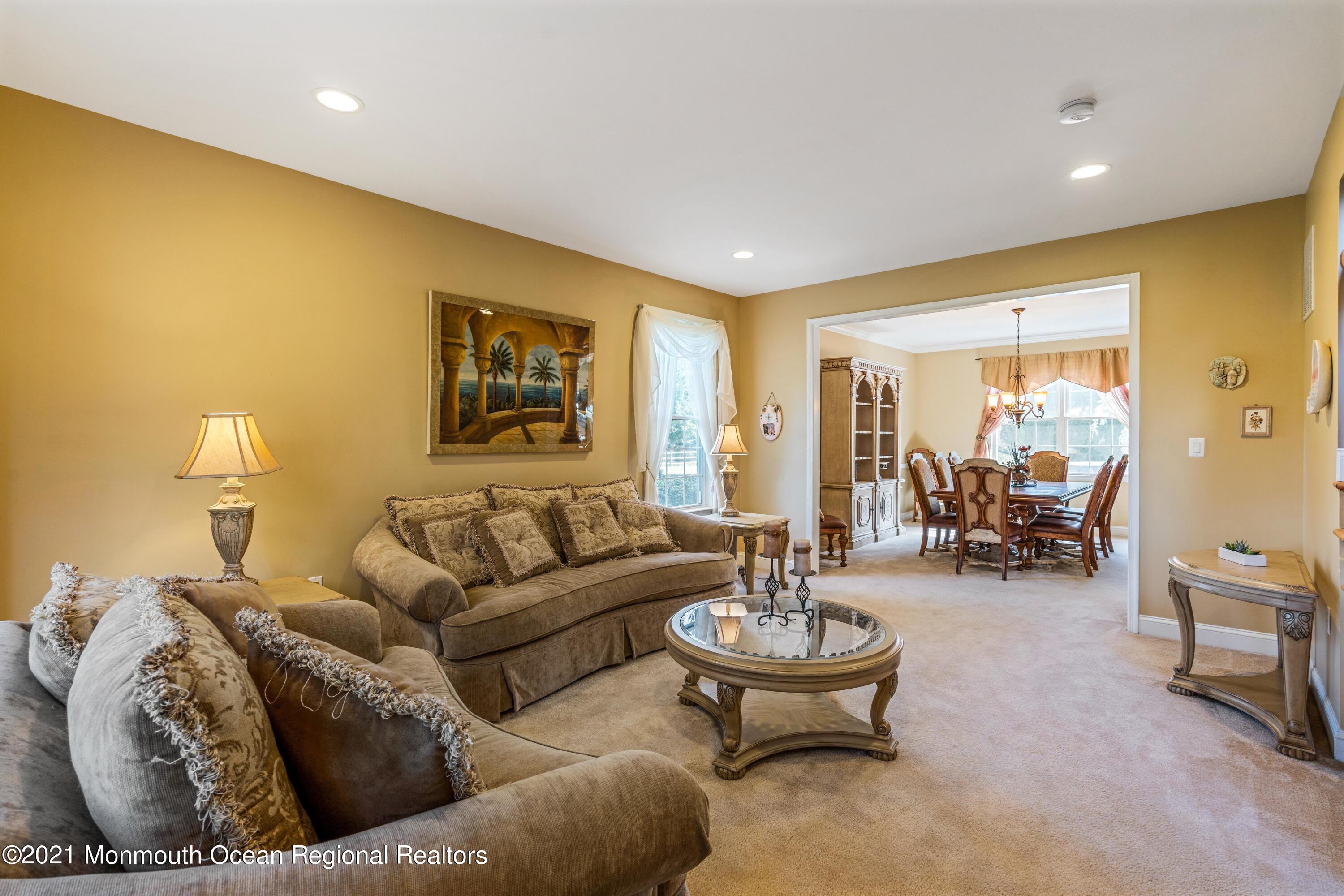5 Michael Drive Cream Ridge, NJ 08514 - Photo 8 of 69 a living room with furniture and a large window