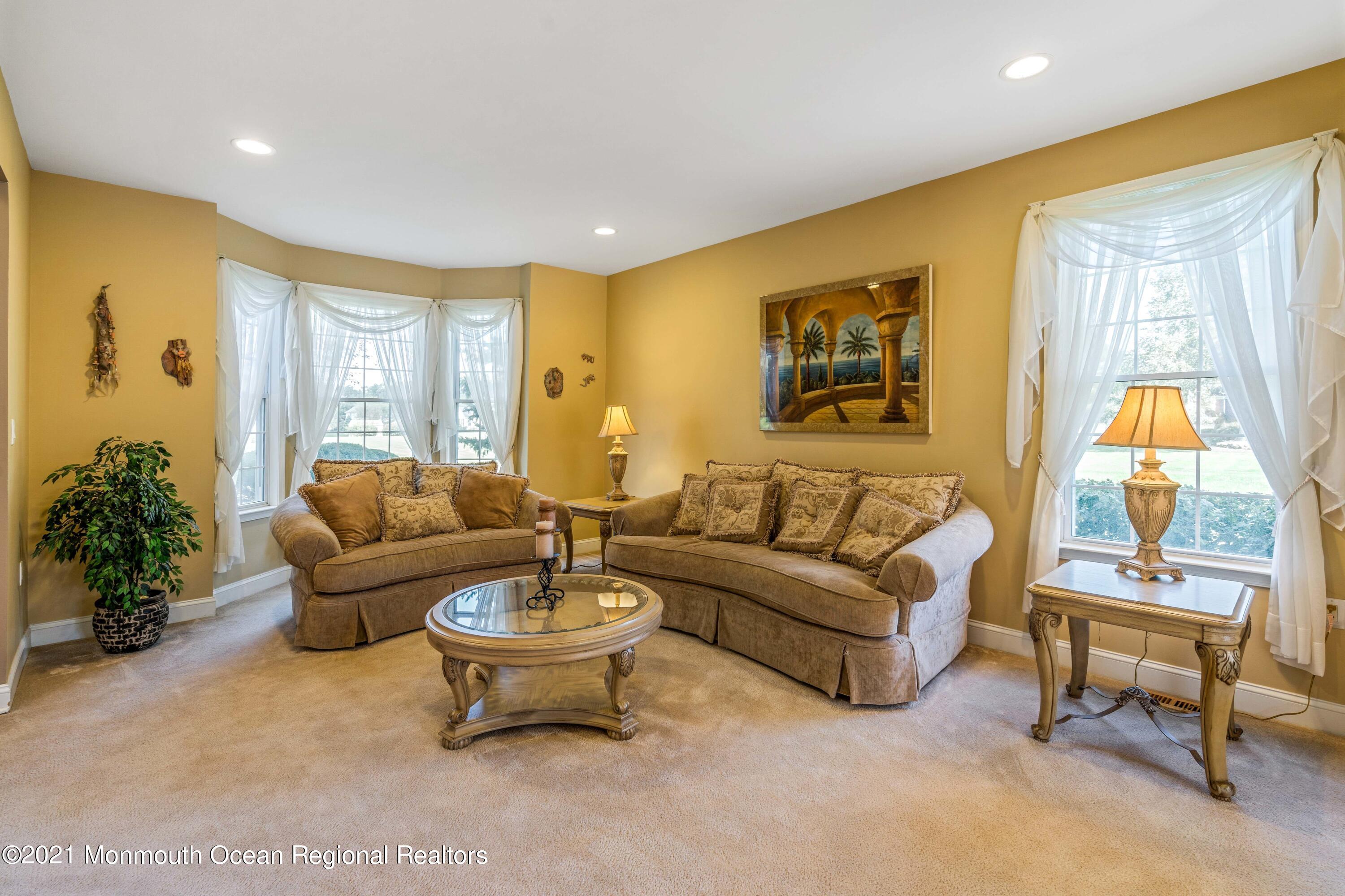 5 Michael Drive Cream Ridge, NJ 08514 - Photo 9 of 69 a living room with furniture and a large window