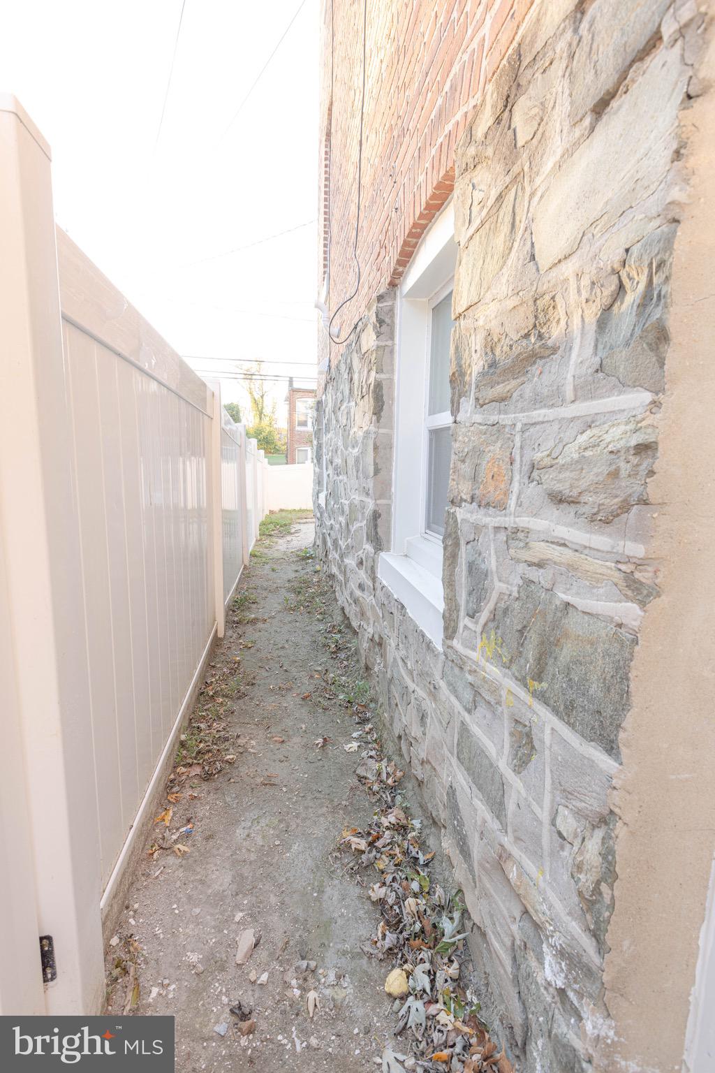 24 South Tremont Road Baltimore, MD 21229 - Photo 34 of 38 Entrance to back yard from outside