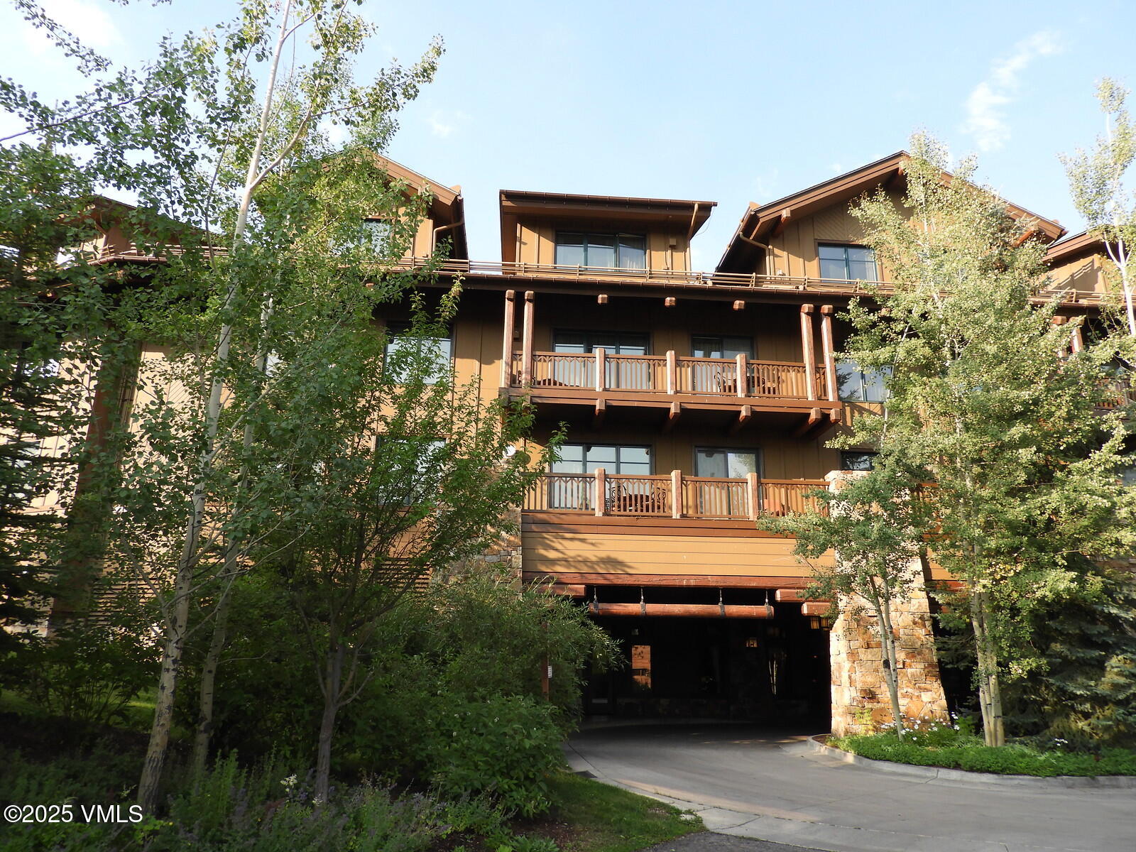 75 Prospector Road, Unit 840216 Aspen, CO 81611 - Photo 20 of 27 a view of house with outdoor space and sitting area