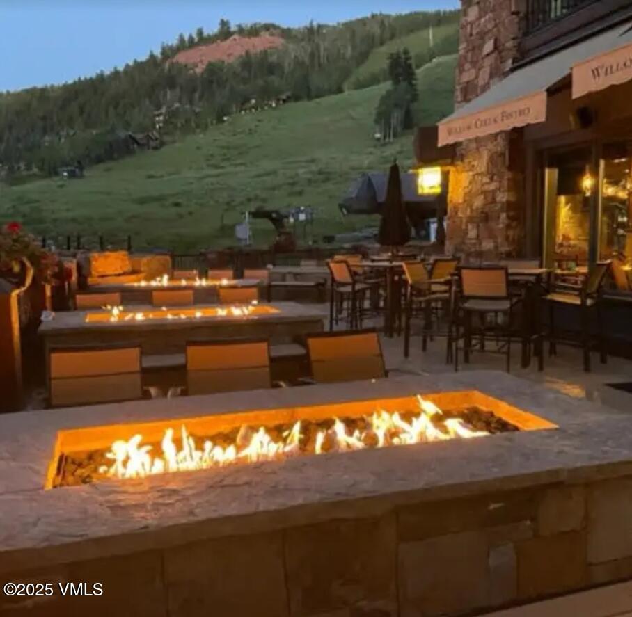 75 Prospector Road, Unit 840216 Aspen, CO 81611 - Photo 25 of 27 a view of swimming pool with outdoor seating