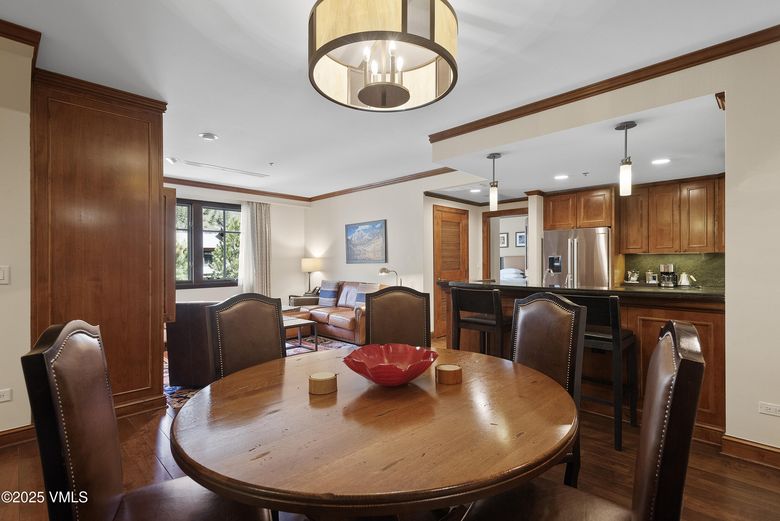 75 Prospector Road, Unit 840216 Aspen, CO 81611 - Photo 5 of 27 a view of a dining room with furniture