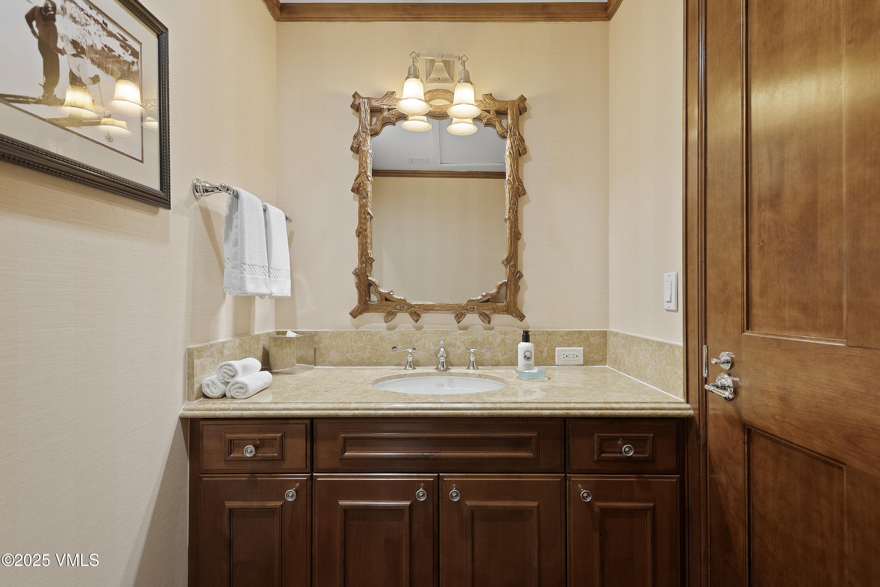 75 Prospector Road, Unit 840216 Aspen, CO 81611 - Photo 9 of 27 a bathroom with a double vanity sink and a mirror