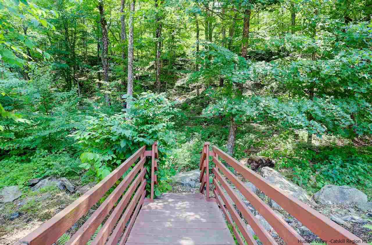 401 Cold Brook Road Bearsville, NY 12409 - Photo 18 of 35 a view of mountain view with wooden stairs and bench