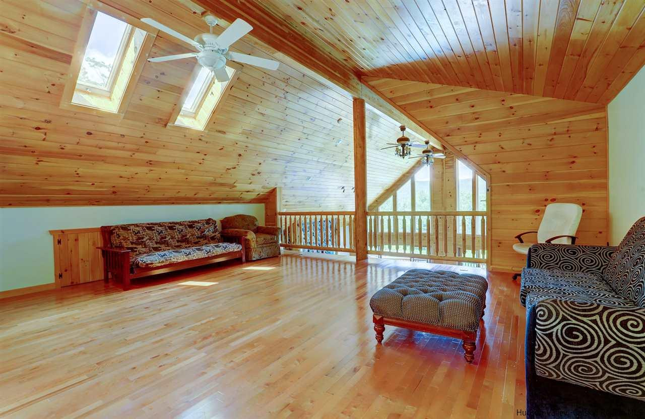 401 Cold Brook Road Bearsville, NY 12409 - Photo 20 of 35 a view of a living room and a wooden floor